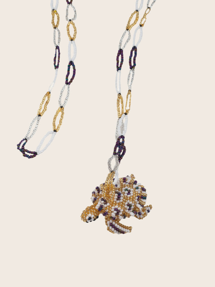 COLLAR TORTUGA MORADO
