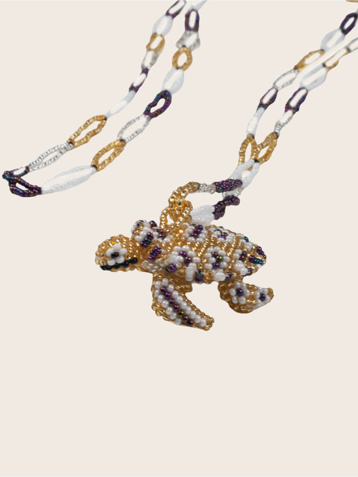 COLLAR TORTUGA MORADO